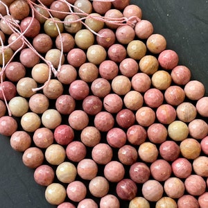 Natural rhodochrosite stone bead faceted 6mm 8mm 10mm round bead . Beautiful natural pink color rhodochrosite gemstone. Full strand 15.5”