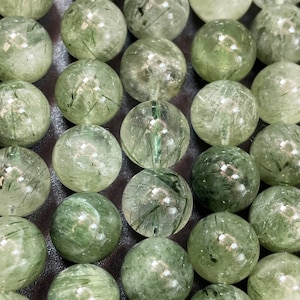 AAA natural green rutilated quartz 8mm 9mm 10mm 12mm  bead . Natural green clear rutilated quartz . Nice quality gemstone bead. Loose bead .