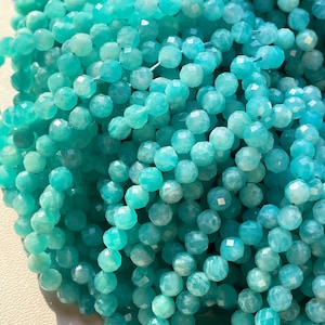 AAA Natural amzonite stone bead . Faceted 5mm round bead . Gorgeous stunning blue color amzonite stone bead. Great quality gemstone.15.5”
