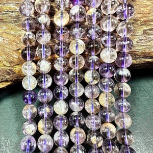 Natural CLEAR Super 7 gemstone bead. 6mm 8mm 10mm round bead  . Beautiful PURPLE COLOR Excellent quality
