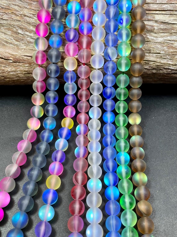 Bead, iridescent glass, translucent matte purple, 8mm round. Sold per  15-1/2 to 16 strand. - Fire Mountain Gems and Beads