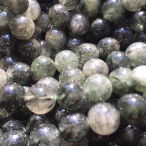 Natural green turmaline rutilated quartz beads . 6mm 8mm 10mm round green rutile quartz turmaline beads . Full strand 15.5” AA quality