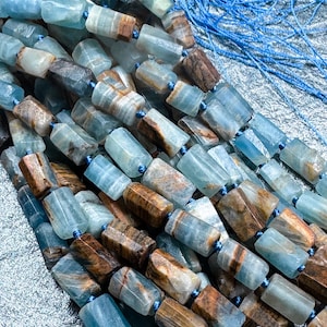 AA Natural blue calcite gemstone bead. 8x12mm tube shape . unique matte finished . excellent quality gemstone bead . full strand 15.5”