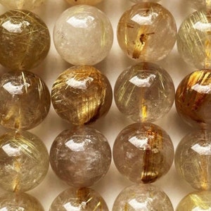 AA Natural gold rutilated quartz stone bead . 4mm 6mm 7mm 8mm 9mm 10mm smooth bead . Gorgeous natural golden color with golden hairs