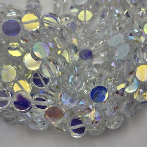 Natural clear quartz crystal stone bead. Faceted 14mm coin shape bead. Gorgeous natural super clear rock crystal quartz gemstone bead.
