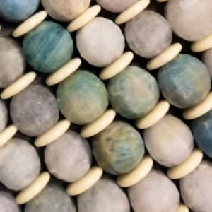 Natural aquamarine beads . Natural gemstone beads . Faceted cut 10mm gemstone bead . Gorgeous natural color . 15.5” strand .