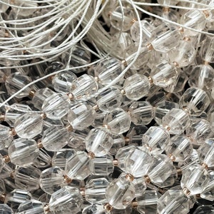 AAA Natural clear quartz crystal bead. Faceted 6mm 8mm diamond shape . Super clear . Real nice quality. Natural quartz bead. Full strand 15.