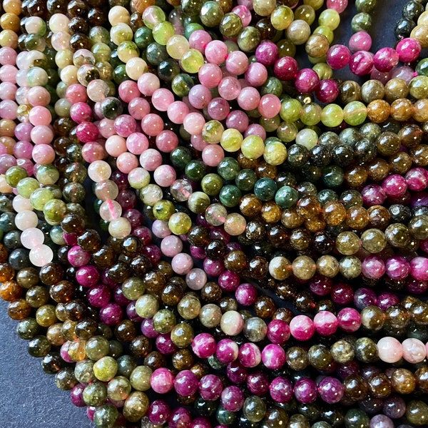 AAA Natural watermelon turmaline bead. 5mm smooth round bead. Beautiful natural multi color turmaline Real nice quality. Longer strand 18”