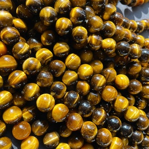 AAA Natural tiger eye stone bead . 4mm 6mm 8mm 10mm 12mm round bead. Gorgeous golden brown color tiger eye . Great quality gemstone . 15.5 image 2