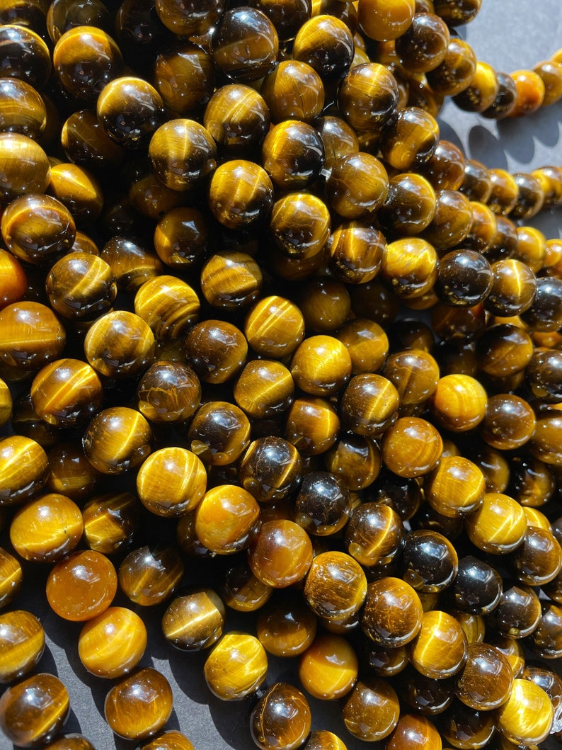 AAA Natural tiger eye stone bead . 4mm 6mm 8mm 10mm 12mm round bead. Gorgeous golden brown color tiger eye . Great quality gemstone . 15.5 image 2