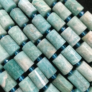 Natural amzonite. Faceted 10x14mm tuba shape gemstone bead . Gorgeous natural green blue color bead . Great quality gemstone. 15.5” strand !