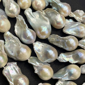 AAA Natural Baroque Pearl. Freeform Shape .16x30mm . Gorgeous Natural white color Baroque pearl . Beautiful natural shape .high quality