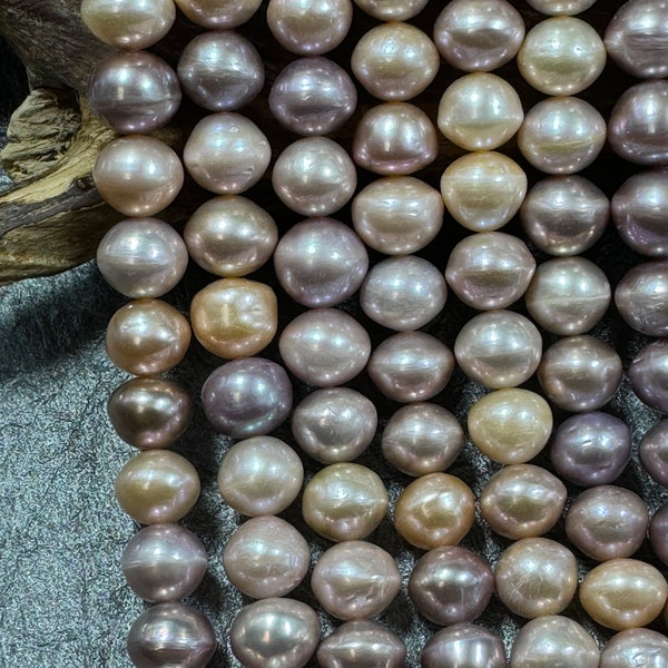 Natural fresh water pearl bead. Gorgeous natural pink purple color .unique natural large size pearl . Excellent quality. Full strand 15.5”
