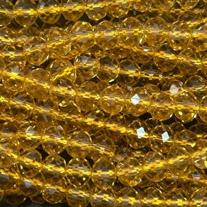 Beautiful Crystal glass bead. Faceted round shape bead. Gorgeous gold orange color, high quality crystal bead! Full strand