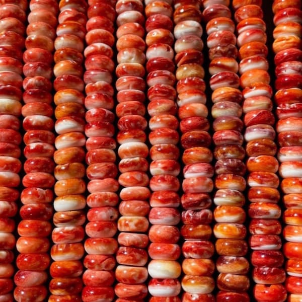 Natural spiny oyster shell bead. 5x8mm Roundell shape. Gorgeous natural orange color . High quality spiny oyster shell bead!