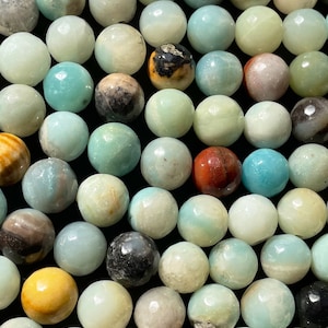 AA natural amzonite stone bead. Faceted 6mm 8mm 10mm 12mm round bead . Gorgeous natural blue brown color gemstone. Great quality 15.5”strand