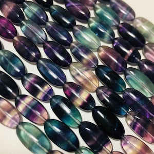 AAA Natural gorgeous fluorite gemstone bead . Super clear fluorite oval shape bead. Great quality fluorite bead . Gemstone 15.5” strand