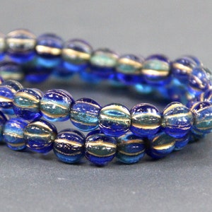 Round 6 mm Fluted Boho Melon Roller Beads With 2 mm Hole, Sapphire And Sky Blue With Gold Wash, 25 pieces