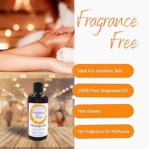 May include: A brown glass bottle of fragrance-free massage oil with a white label that says "Fragrance Free Massage Oil Pure Grapeseed Oil Tender Essence All Natural Ingredients". The bottle is sitting on a wooden surface. The image also includes text that says "Fragrance Free", "Ideal For Sensitive Skin", "100% Pure Grapeseed Oil", "Non Greasy", and "No Fragrance Or Perfumes".