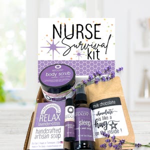 May include: A Nurse Survival Kit gift box containing a jar of lavender and sweet orange body scrub, a bar of lavender and citrus handcrafted artisan soap, a lavender and honey lip balm, a sleep spray, and a bag of milk chocolate with text.