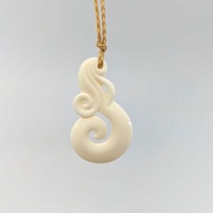 Hand Carved Bone Lady of the Sea Koru Spiral Necklace
