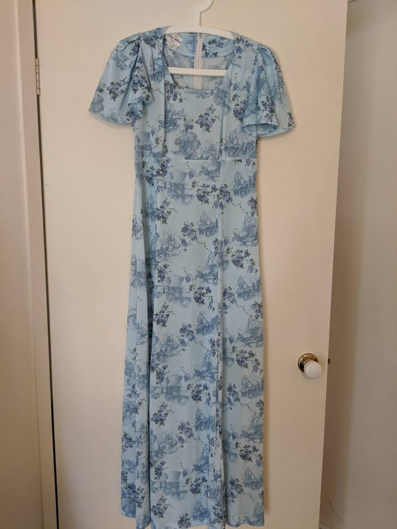 Vintage Blue maxidress with flutter sleeves and novelty print