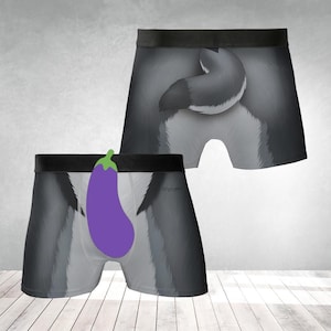 May include: A pair of gray boxer briefs with a cartoon eggplant graphic on the front and a cartoon tail on the back.