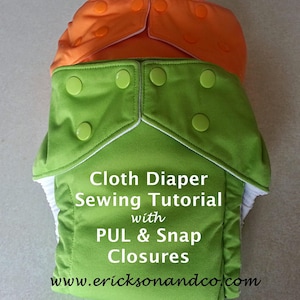 May include: A green and orange cloth diaper with white trim and snaps. The diaper has the text "Cloth Diaper Sewing Tutorial with PUL & Snap Closures" and "www.ericksonandco.com".