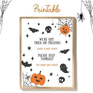 May include: Printable Halloween sign with a black frame and white background. The sign features a black spider, bats, skulls, and pumpkins. The text reads "We're out trick-or-treating just like you! Please help yourself to one or two!"