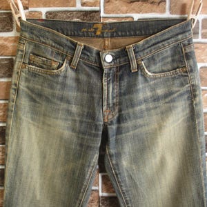 7 For All Mankind Fabriqué aux États-Unis Jean évasé taille basse en coton/polyuréthane délavé effet vieilli Pantalon en denim Taille 27