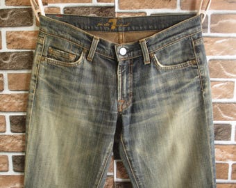7 For All Mankind Wyprodukowano w USA Jeansy z niskim stanem, rozkloszowane, z bawełny/poliuretanu, z efektem sprania, z rozszerzanymi nogawkami, rozmiar 27