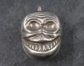 Pedante del cranio di sorridente strisciante vintage Sterling