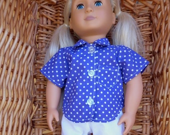 A purple spotted shirt with white flared pants to fit an 18 inch doll.