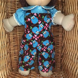 Girls' brown corduroy overalls with a pretty blue spotted blouse to fit your 16 inch Cabbage Patch Doll.