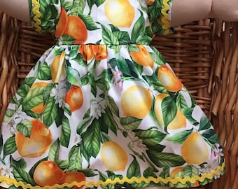 Pretty oranges and lemons mid length dress and matching panties for a 16 inch Cabbage Patch Doll.