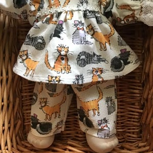 Girls' grey flannelette pyjama set with cute kittens to fit your 16 inch Cabbage Patch Doll.