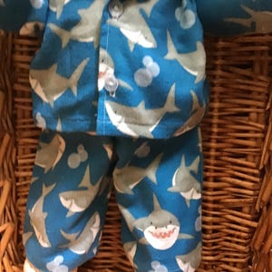 Boys' blue flannelette pyjamas with sharks to fit a 16 inch Cabbage Patch Doll.