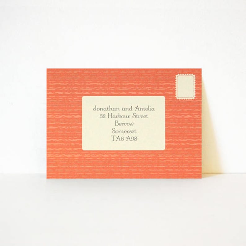 May include: An orange envelope with a white label that reads "Jonathan and Amelia, 32 Harbour Street, Barrow, Somerset, TA6 498".