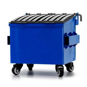 May include: A blue commercial dumpster with a black lid and wheels. The dumpster is rectangular with a hinged lid and is designed for waste disposal. The wheels allow for easy movement.