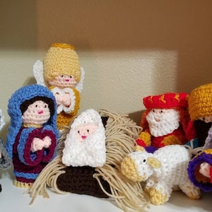 Nativity 9 crocheted pieces. Baby Jesus,  Mary. Joseph, three wise men, angel, donkey and a sheep.  Perfect for little hands