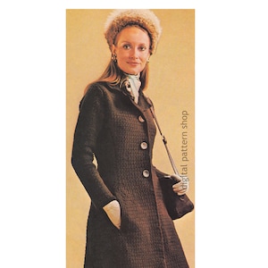 May include: A brown knitted coat with a collar, buttons, and pockets. The coat is worn by a woman with long blonde hair and a brown fur hat. The text "digital pattern shop" is visible on the right side of the image.