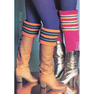May include: Two pairs of knitted leg warmers in a striped pattern. One pair is orange, green, and blue, and the other is pink, yellow, and green. The leg warmers are worn over brown and gold boots.