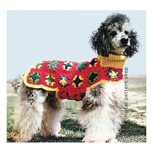 May include: A poodle wearing a red crochet dog coat with a yellow collar. The coat features colorful floral patterns in blue, green, and yellow. The words "digital pattern shop" are printed vertically on the right side of the image.