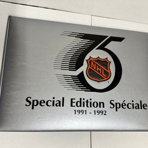Juego de fábrica de tarjetas de hockey Kraft de 1991 con todas las inserciones en la carpeta
