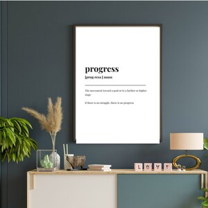 Puede incluir: Una impresión de arte de pared imprimible en blanco y negro con la palabra "progreso" definida como "el movimiento hacia una meta o hacia una etapa posterior o superior" y la frase "si no hay lucha, no hay progreso".