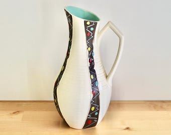 鋳物 花瓶 黒色 曲線デザイン 珍しいブレントレー ウェアの黒の曲線陶器の花瓶 - Etsy 日本