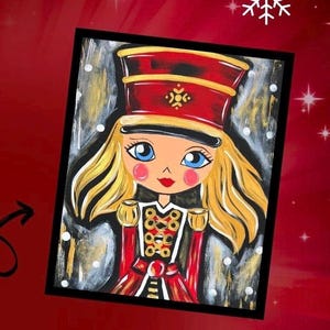 May include: A painting of a girl dressed as a nutcracker. She has blonde hair, blue eyes, and is wearing a red and gold uniform with a black hat. The background is a white and gold abstract design.