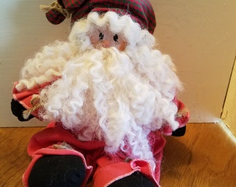large stuffed sitting santa claus