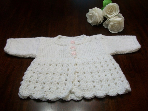 newborn white sweater