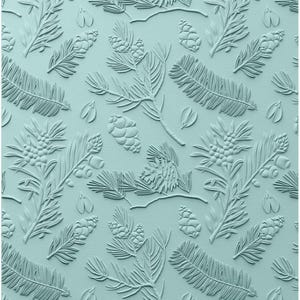 May include: A light blue background with a repeating pattern of pine branches and pine cones. The pattern is embossed, creating a 3D effect.
